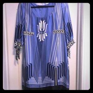 Flowy silk patterned dress.